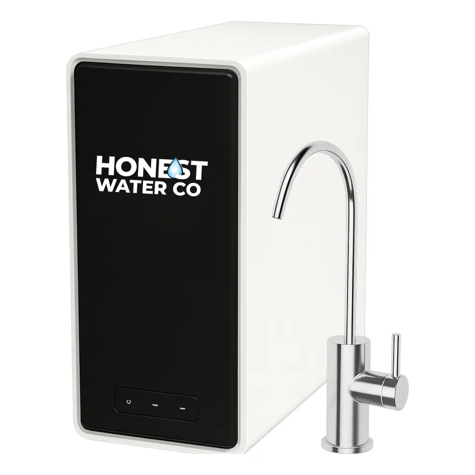 Close-up of tankless RO unit and chrome faucet